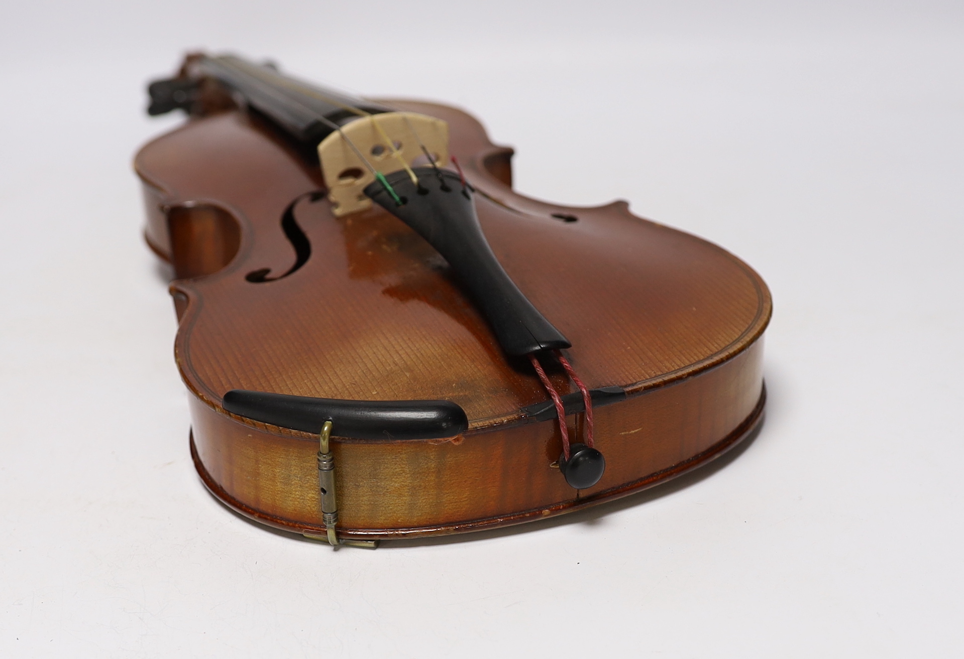 A cased 3/4 sized student violin marked Dresden, with reproduction Stradivarius label